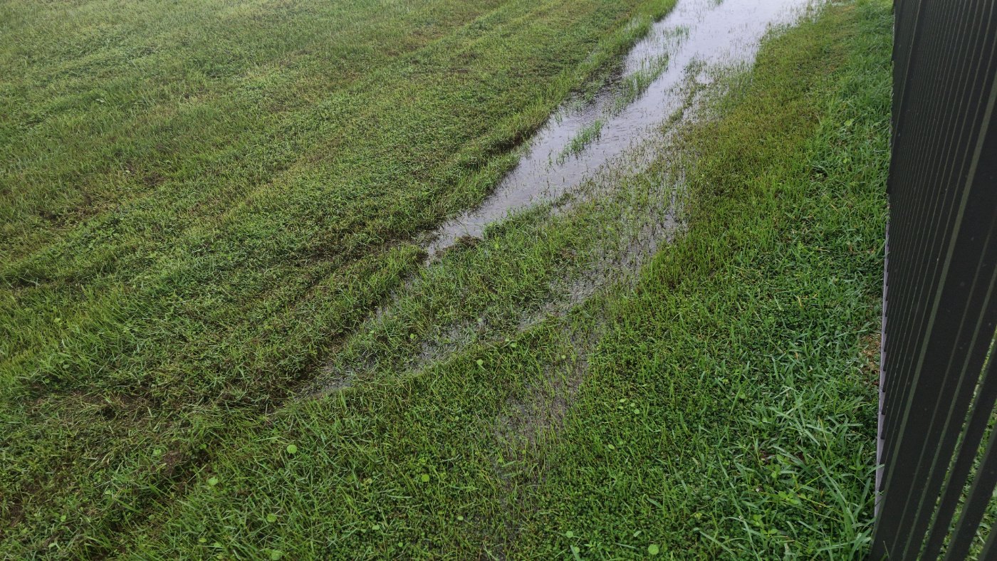 Detail of the water channel outside the fence
