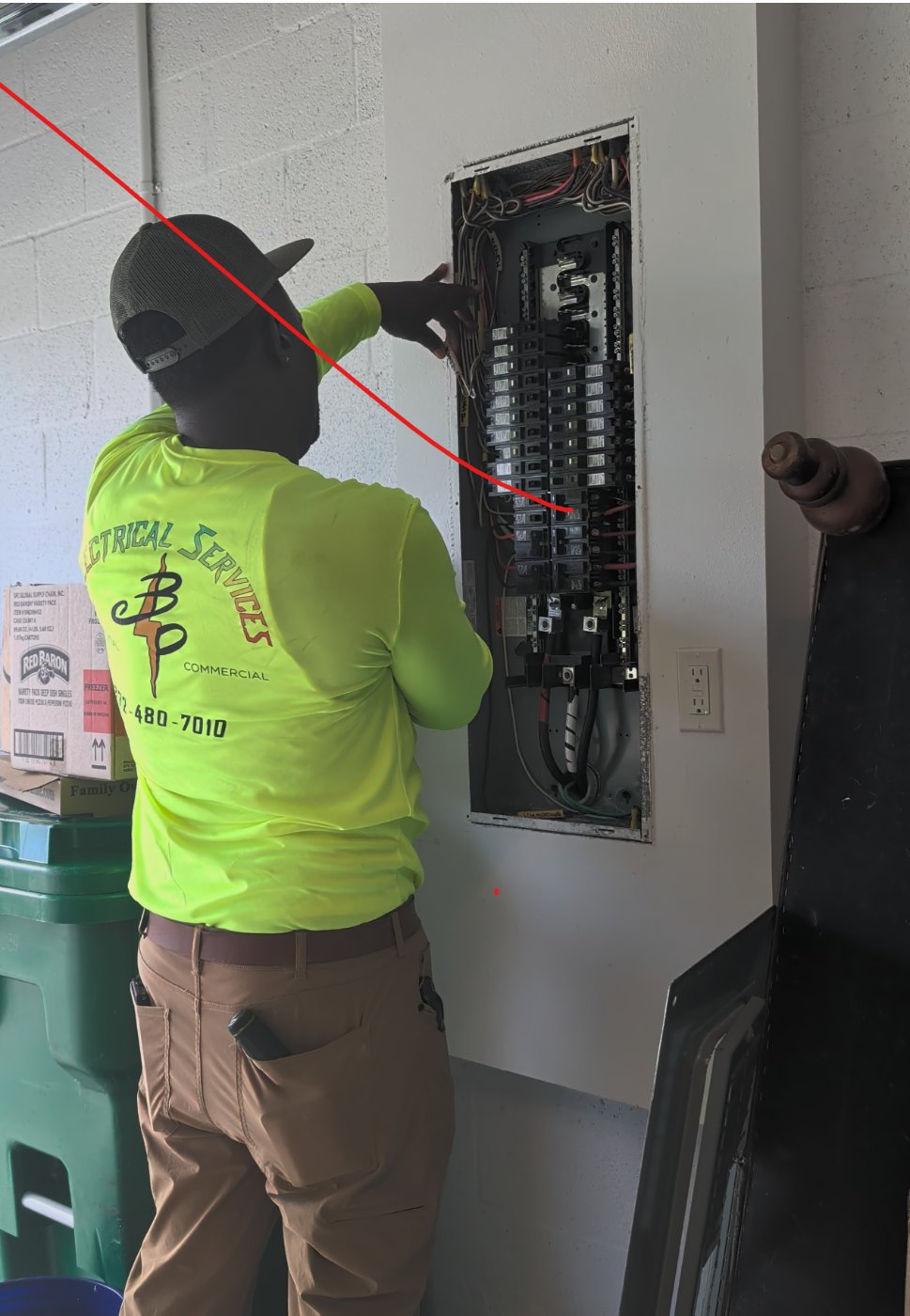 B&P electrician at the open panel